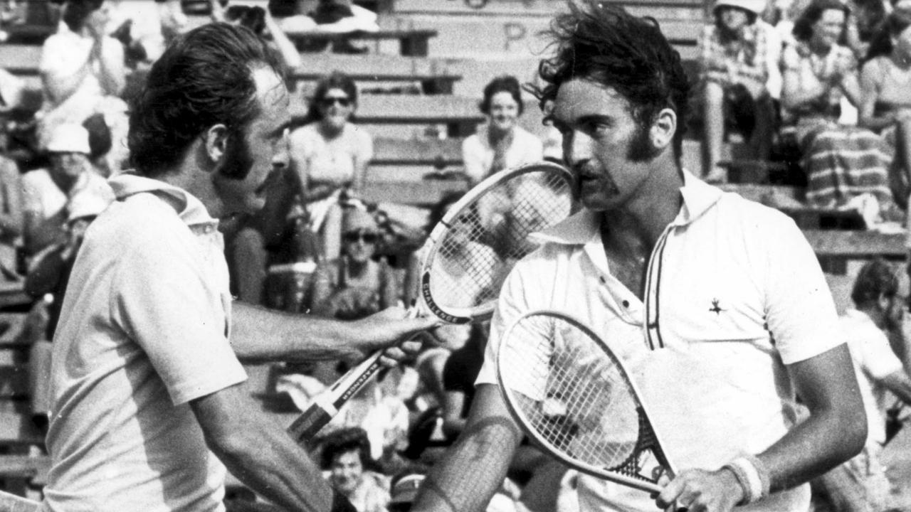 Tennis Player Mark Edmondson (R) shaking hands with John Newcombe (L) after winning Australian Open Mens Final match at Kooyonga, Victoria in 1976.