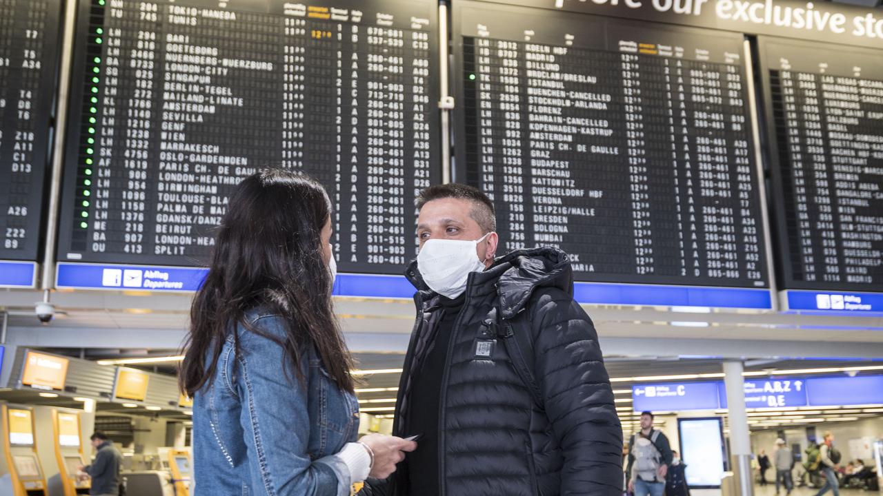 Passengers with face masks pictured at Frankfurt Airport. Picture: Thomas Lohnes/Getty Images