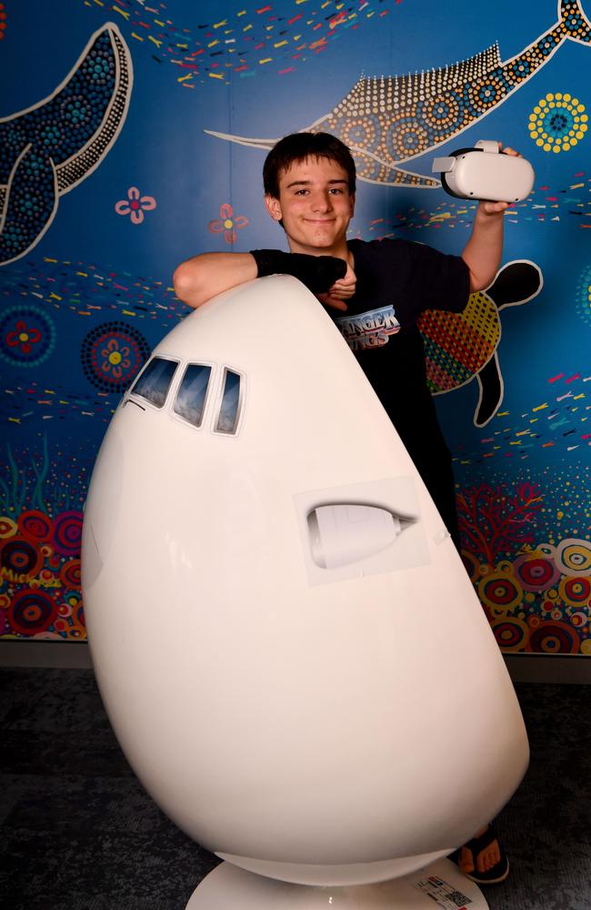 Ronald McDonald House resident Ethan Watson, 14, with the new immersive VR Therapy Pod at Ronald McDonalds House Charities North Australia in Douglas. Picture: Evan Morgan