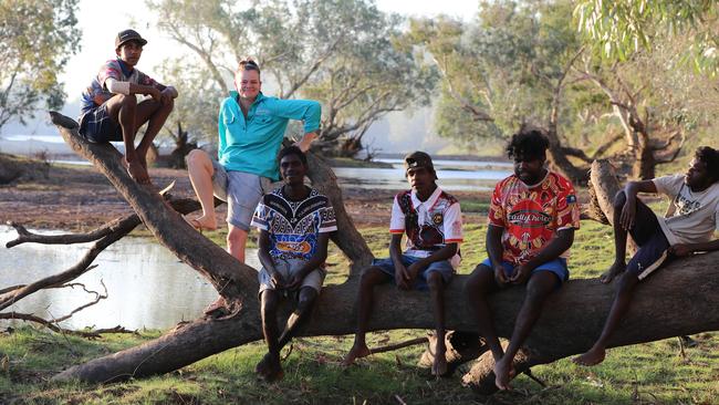 Brettlyn Neal (aka “The Beaver’’) with Doomadgee youth including (<i>top</i>, <i>left to right</i>) Tyron ”Dingo Bone” Dick, Malachi George, Jessie George, Elijha Douglas and Wilfred Walden. Picture: Peter Wallis