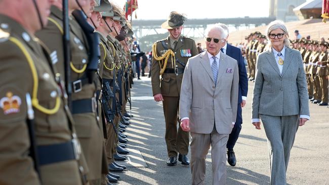 King Charles III and Governor-General Sam Mostyn walk a Guard comprising selected members of Their Majesties’ affiliated units, the 1st Armoured Regiment and the Royal Australian Corps of Military Police. Picture: Chris Jackson/Getty Images