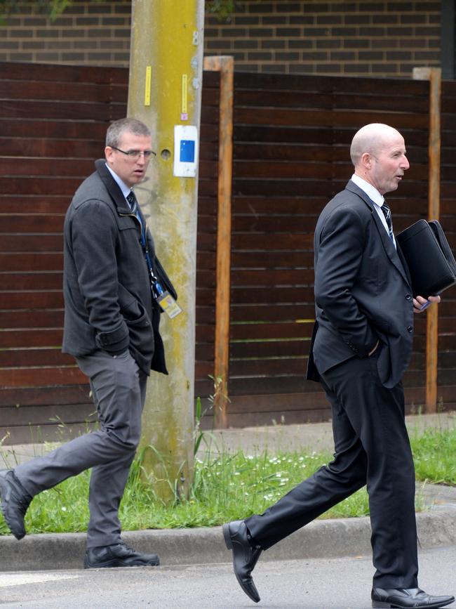 Police speak to residents of Larissa Court, Croydon after yesterday's murder on Eastlink. Picture: Andrew Henshaw