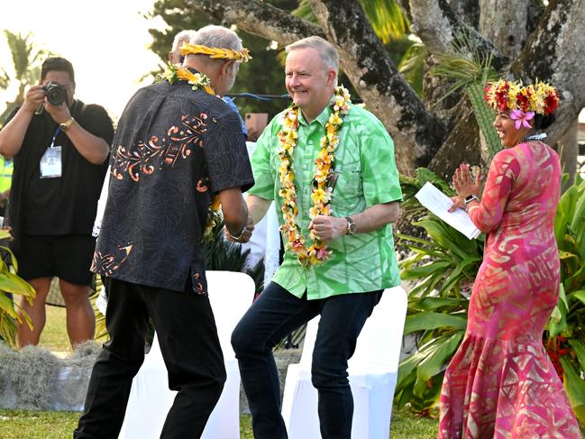 Australia’s Prime Minister Anthony Albanese dances before receiving a gift during a welcome ceremony the Pacific Islands Forum (PIF) in Aitutaki, Cook Islands, Wednesday, November 8, 2023. (AAP Image/Mick Tsikas) NO ARCHIVING