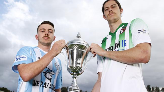 Palm Beach captain Harry Liebke and Southport captain Morgan Saunders with the trophy ahead of the Gold Coast Premier League final in 2021. Picture: Tertius Pickard