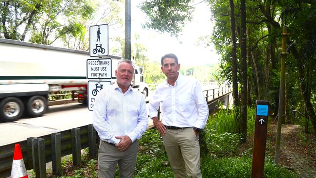 Deputy Opposition leader Cameron Dick with Cairns MP Michael Healy at the Barron River bridge outside Kuranda on Friday. Picture: Peter Carruthers