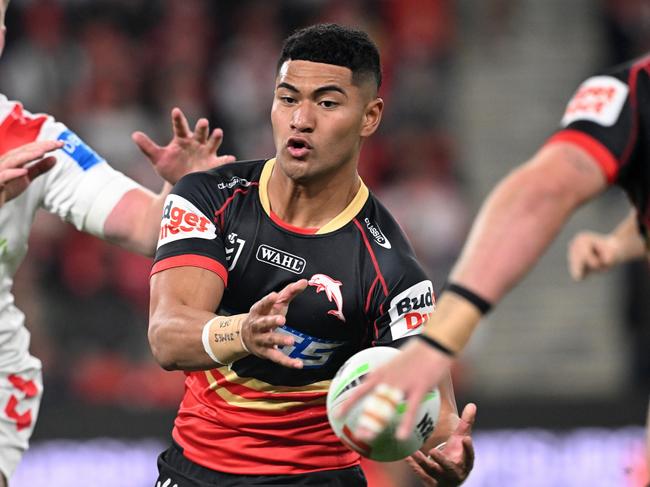 BRISBANE, AUSTRALIA - JUNE 06: Isaiya Katoa of the Dolphins passes the ball during the round 14 NRL match between Dolphins and St George Illawarra Dragons at Suncorp Stadium, on June 06, 2025, in Brisbane, Australia. (Photo by Bradley Kanaris/Getty Images)