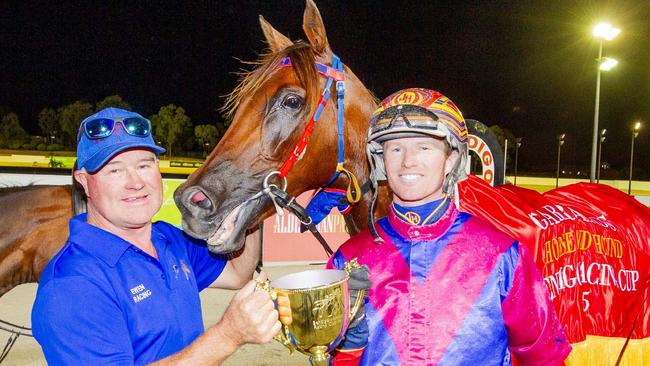 Trainer Scott Ewen (left) and driver James Herbertson with Bendigo Pacing Cup winner Bulletproof Boy. Picture: Stuart McCormick