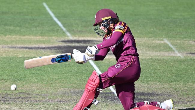 Charli Knott of the Fire hits a boundary. (Photo by Steve Bell/Getty Images)