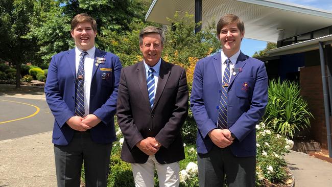 St Paul's students and identical twins Luke and Connor Ibbotson with Principal Cameron Herbert.