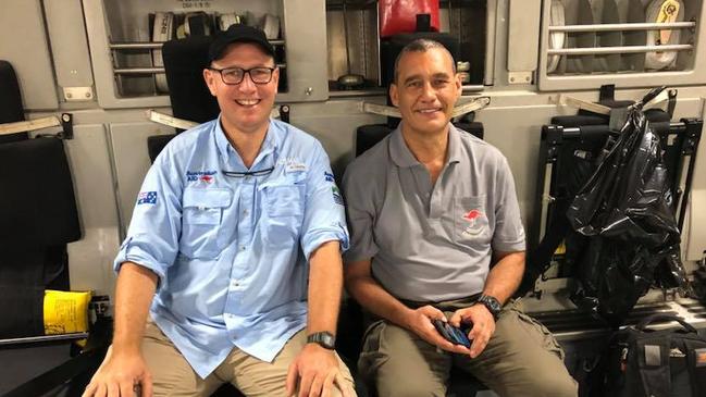 Thailand cave diving heroes Dr Richard Harris and Craig Challen sitting in the back of an RAAF C17 on the way back to Australia. Picture: Facebook