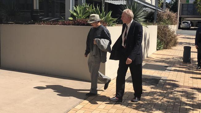 Vincent Berg (right) arrives at Southport Courthouse with his son Andreas.