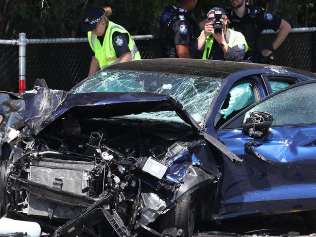 Police at the scene of a fatal crash at the intersection of Castle Hill Drive and Dohles Rocks road at Murrumba Downs on Thursday. Picture Lachie Millard