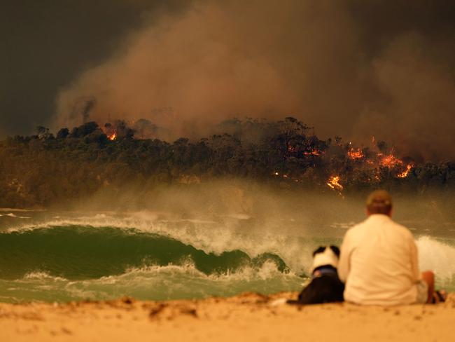 Bushfire arrives into the township of Malua Bay in NSW, on New Year’s Eve 2019/20. Greg Mullins says the upcoming season won’t be as bad as Black Summer but there will likely be some big fires. Picture: Alex Coppel