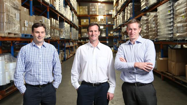 SWEET SUCCESS: Himstedt brothers, Sam, Fred and Tom, pictured in 2014, who with father Ross transformed the Queen Fine Foods business. Picture: Russell Shakespeare