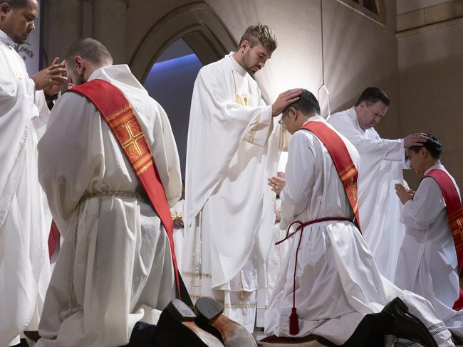 EMBARGO FOR TWAM 12 AUG 2023. FEE MAY APPLY. WEEKENDAUSTRALIANMAGAZINE- Feature story on the Ordination of Gerard Lai, Minje Kim and Issac Falzon at the Cathedral of Saint Stephen, Brisbane.  Thursday 29 June 2023 Photo by Natalie Grono