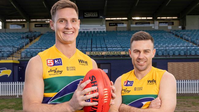 Woodville-West Torrens greats Luke Thompson (left) and Matthew Goldsworthy at Woodville Oval this week. Picture: Ben Clark