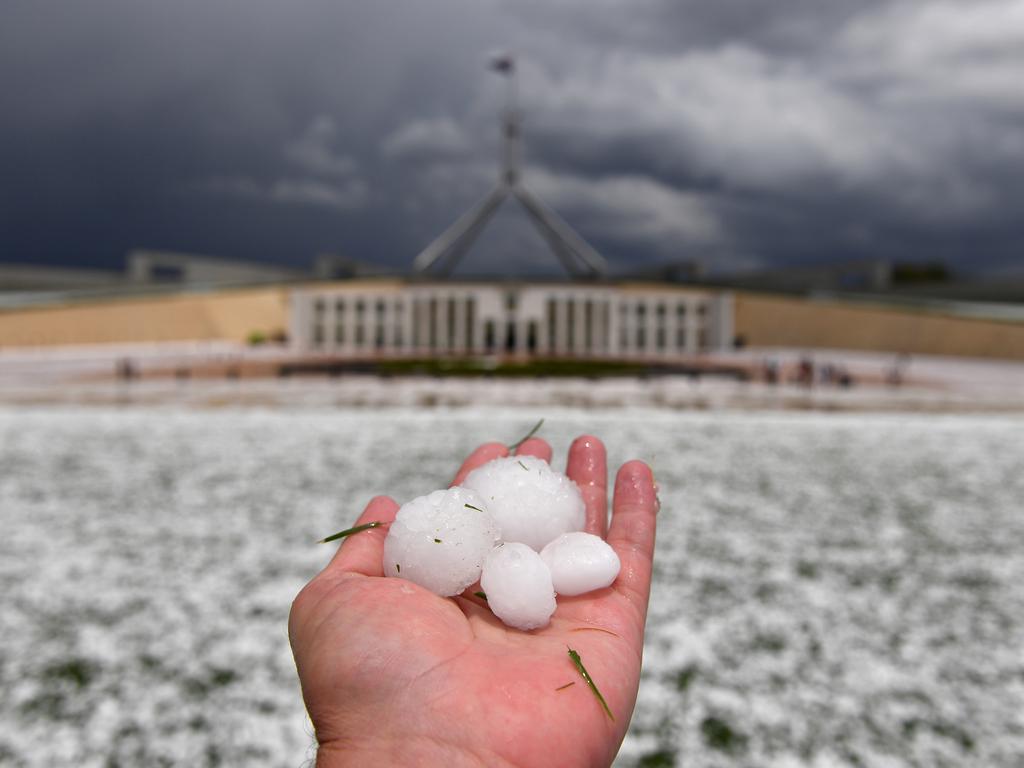 Golf ball size hail after a severe hailstorm is seen at Parliament House in Canberra. Picture: Mick Tsikas/AAP