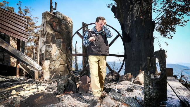 Binna Burra Lodge's Steve Noakes has been left devastated by the destruction of the once picturesque lodge which now lays in ruins. Picture: Nigel Hallett