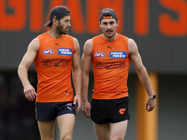 Ward went from idol to mentor for Lachie Ash. Picture: Phil Hillyard