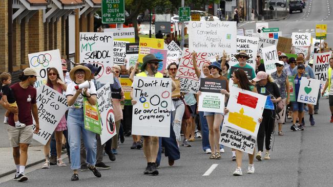 Locals rally against the plan to demolish and rebuild the Gabba, which would also result in the knocking down of a local school. Picture: NCA NewsWire/Tertius Pickard