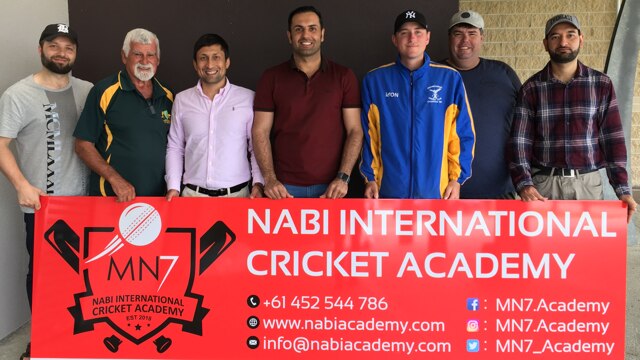 Mohammad Nabi (centre) with partners in the Nabi International Cricket Academy.