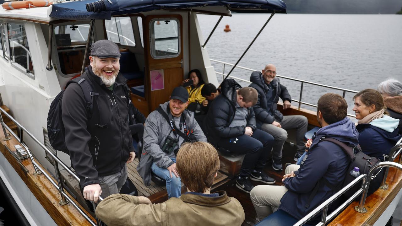Organiser Alan McKenna (standing) joins Nessie hunters on board a boat on Loch Ness. Picture: Jeff J Mitchell/Getty Images