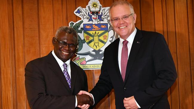 Scott Morrison meets Solomon Islands Prime Minister Manasseh Sogavare in Honiara in 2019 on his first overseas trip as leader. Picture: AAP