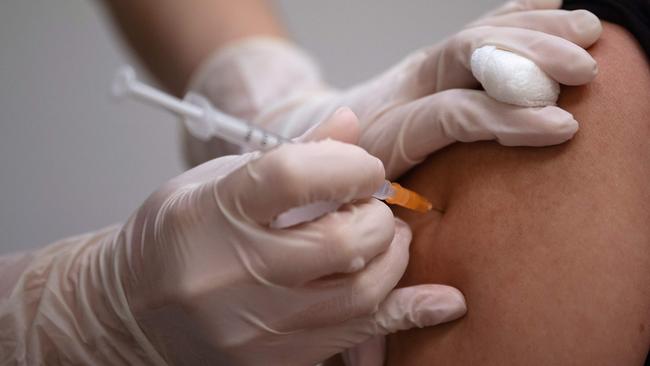 Australia’s slow vaccine rollout is frustrating for those with skin in the game. Picture: Mohd Rasfan/AFP.