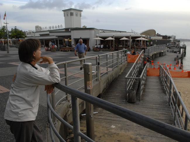 Manly Wharf, pictured in 2007, was known for a small colony of little penguins, popular with tourists, that lived beneath the boardwalk. Picture: Jim Trifyllis