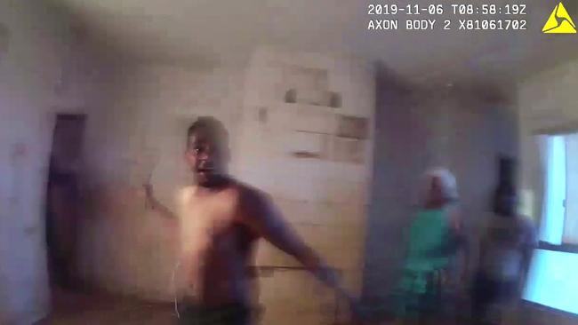 NT Police body-cam footage showing Kumanjayi Walker threatening police with an axe the day before he was shot by police officer Zachary Rolfe.