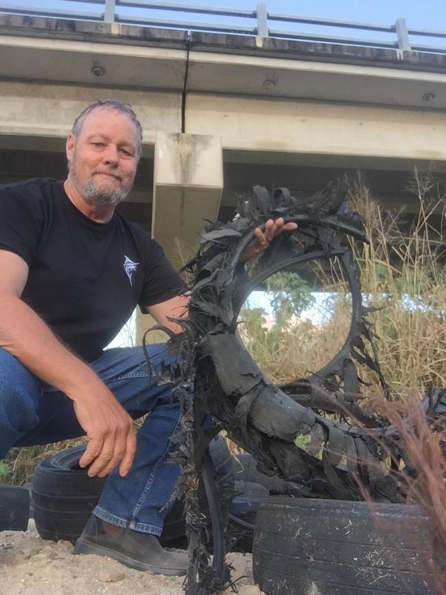 TIDY's Dave Dudley was disgusted by the amount of illegally dumped rubbish he was finding at the Bohle River. Picture: Supplied.