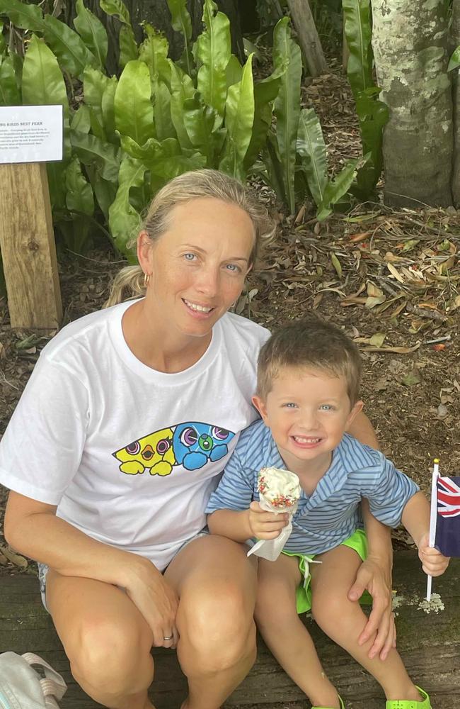 Natalia with her child at the Hervey Bay Historical Society's Australia Day event.