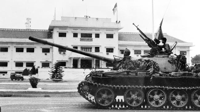 APRIL 30, 1975 : This file photo dated 30/04/75 shows a soldier perched on a tank of the North Vietnamese Army (NVA) in Saigon, as the city falls into the hands of communist troops. Viietnam / Armed Forces Historical