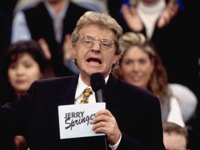 Talk show host Jerry Springer talks to his guests and audience on the set of The Jerry Springer Show. The show is known for its sensational topics and the fights and arguments that frequently break out among the guests. (Photo by ÃÂ© Ralf-Finn Hestoft/CORBIS/Corbis via Getty Images)