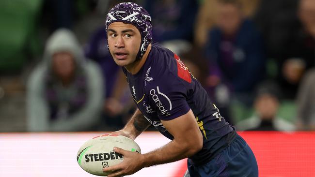 MELBOURNE, AUSTRALIA - MAY 11:  Jahrome Hughes of the Storm looks to pass the ball during the round 11 NRL match between Melbourne Storm and Brisbane Broncos at AAMI Park on May 11, 2023 in Melbourne, Australia. (Photo by Robert Cianflone/Getty Images)