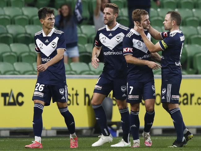 Callum McManaman (second from right) celebrates with his Victory teammates after scoring against the Mariners. Picture: Daniel Pockett/Getty Images
