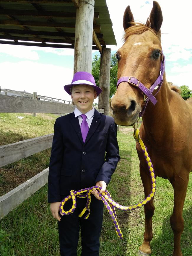 Thomas, 10, wins $50 for 3rd prize in the Grafton Jacaranda Festival's official 2020 Midcoast Family Day Care Best Dressed Boy competition.