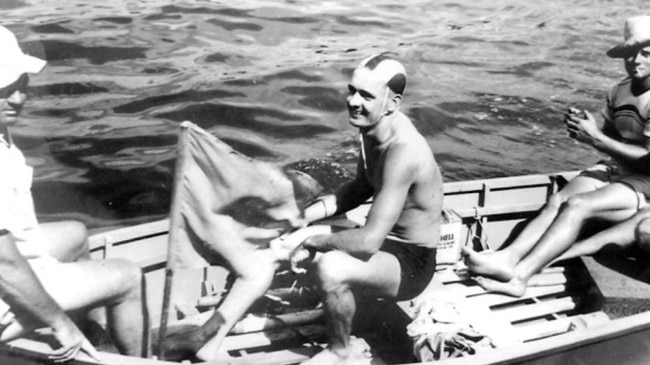 Kauko Kaurila, aboard the tow boat after finishing second in the 1955 Magnetic Island swim, in 1954.