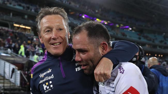 Melbourne coach Craig Bellamy celebrates victory with Melbourne's Cameron Smith after the 2020 NRL Grand Final between the Penrith Panthers and Melbourne Storm at ANZ Stadium, Homebush. Picture: Brett Costello