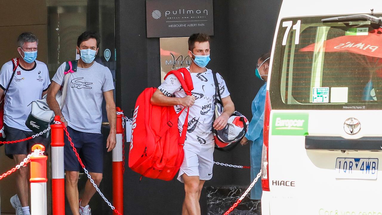 Tennis players and support staff prepare to be transported to training in the lead-up to the 2021 Australian Open. Picture: Getty Images