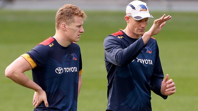 JACOBS THE MENTOR: Sam Jacobs (right) hands out some advice to Reilly O’Brien at Crows training. PICTURE: Simon Cross.