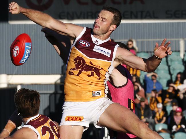 Lion Josh Walker dominated Jarryd Roughead in Brisbane’s win over Hawthorn in Tasmania. Picture: Chris Kidd