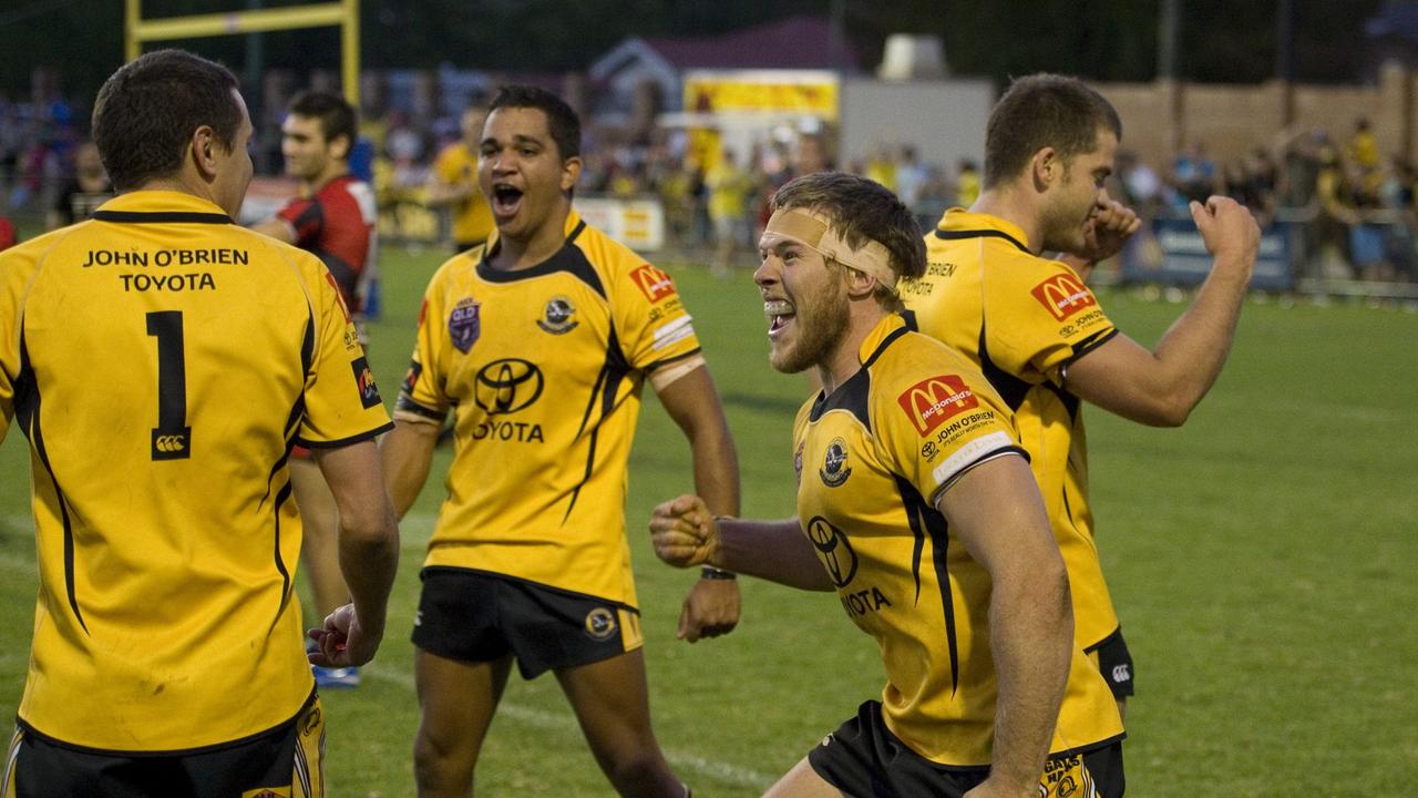 Gatton players including (from left) Aaron Werth, Ashley Boney and Ben Reuter celebrate their win. Photo: Kevin Farmer