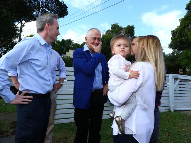 Prime Minister Malcolm Turnbull, Treasurer Scott Morrison and local member for Banks David Coleman meet with local family Julian and Kim Mignacca and daughter Addison 1 in Penshurst, Sydney. Picture: Britta Campion