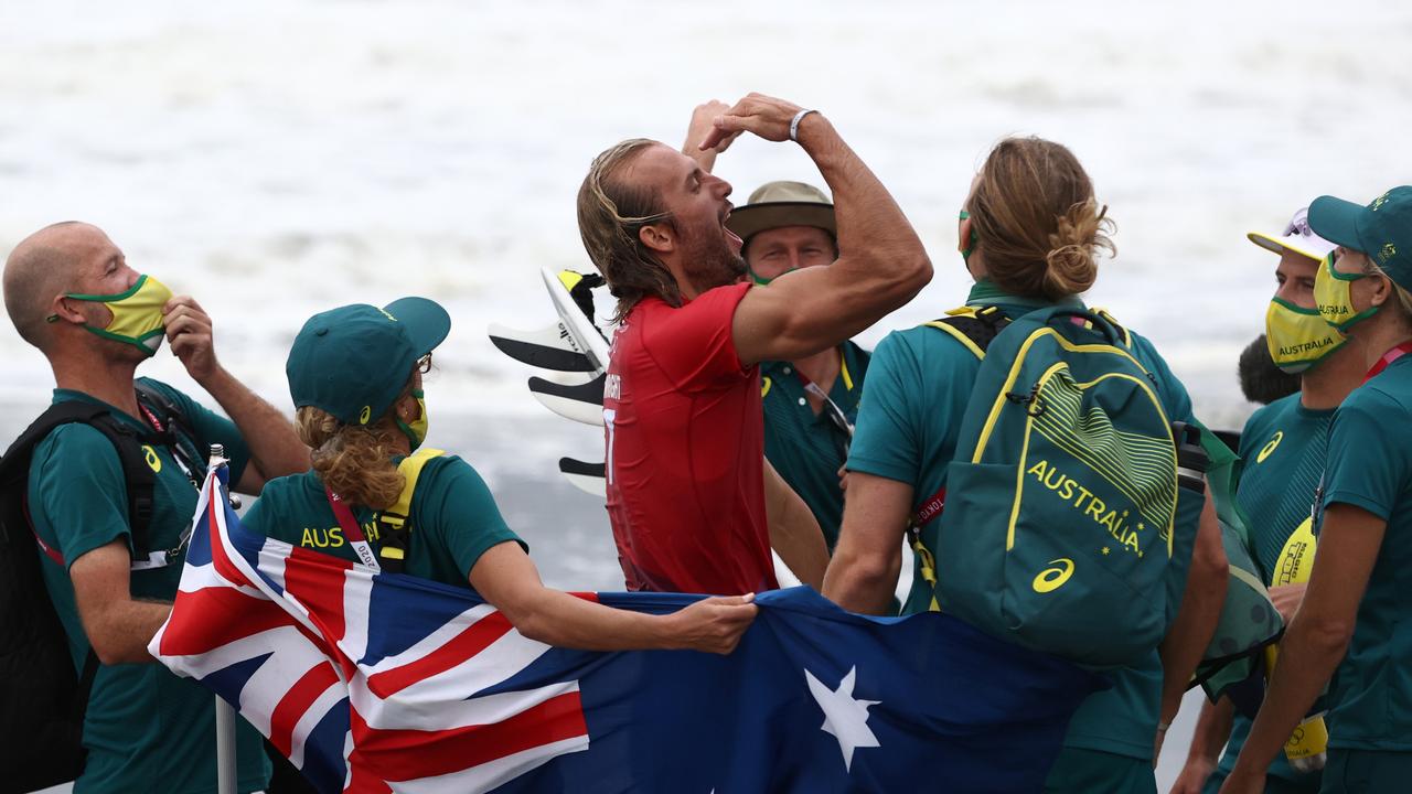 Owen Wright of Team Australia celebrates his win over Jeremy Flores of Team France in their men's round 3 heat on day three of the Tokyo 2020 Olympic Games. Picture: Ryan Pierse/Getty Images