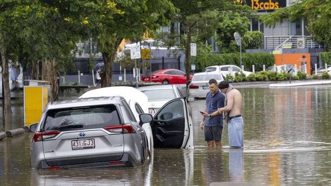 Flooding at Emu Lane, Woolloongabba on Saturday. Picture: Richard Walker