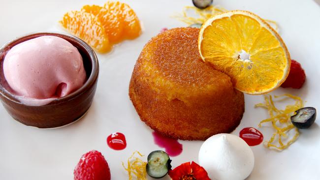 <span id="U623132600788uJE" style="font-weight:bold;font-style:normal;">TASTE SENSATION:</span> Ollie’s Torta Alla’arancia e mandorle, a warm orange and almond cake with Cointreau and raspberry sorbet. Picture: ANNA ROGERS