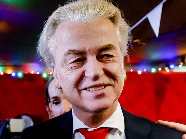 TOPSHOT - PVV leader Geert Wilders reacts to the results of the House of Representatives elections in Scheveningen, the Netherlands, 22 November 2023. The far-right, anti-Islam party of firebrand politician Geert Wilders has won a stunning victory in the Dutch election, partial results showed Wednesday, a political bombshell that will resound in Europe and around the world. (Photo by Remko de Waal / ANP / AFP) / Netherlands OUT - Belgium OUT