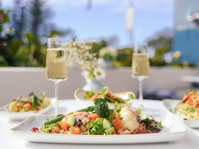 Trackside dining at Rhapsody Beachside Café at Surfers Paradise.