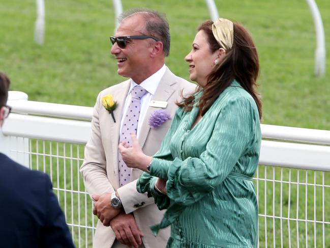 Annastacia Palaszczuk with Reza Adib at the Melbourne Cup day at Brisbane Spring Racing Carnival, Eagle Farm in 2021. Picture: Steve Pohlne